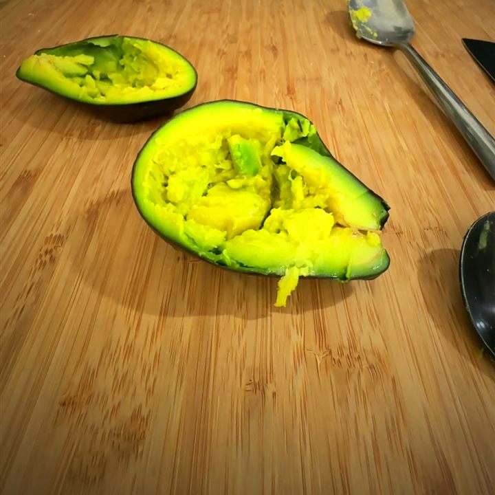 A ripe Brogdon avocado cut open